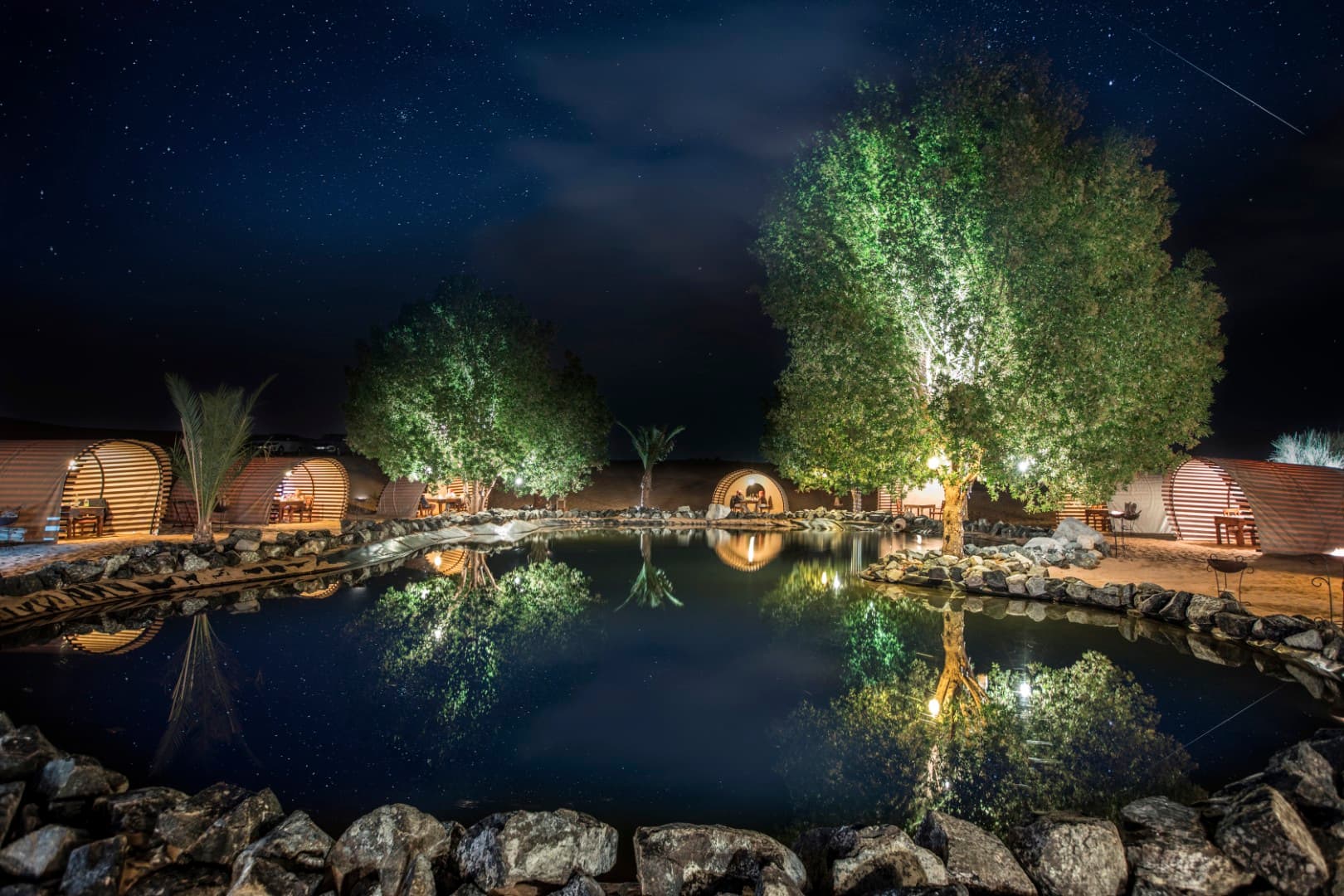 Guests enjoying the premium desert camp atmosphere at Platinum Desert Safari in Dubai