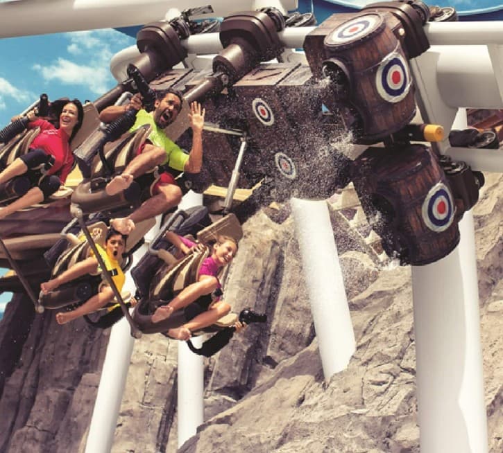 Guests enjoying the Bandit Bomber water coaster activity at Yas Waterworld Abu Dhabi.