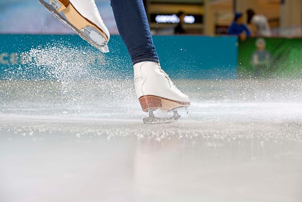 Visitors practicing ice skating at the Dubai Ice Rink, enjoying the indoor skating experience.