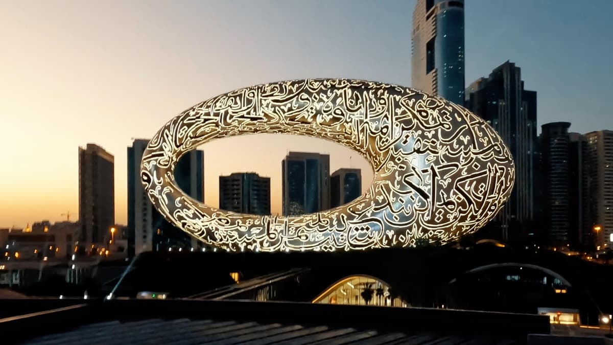 Russian-speaking tourists visiting the Museum of the Future during a Dubai city tour.