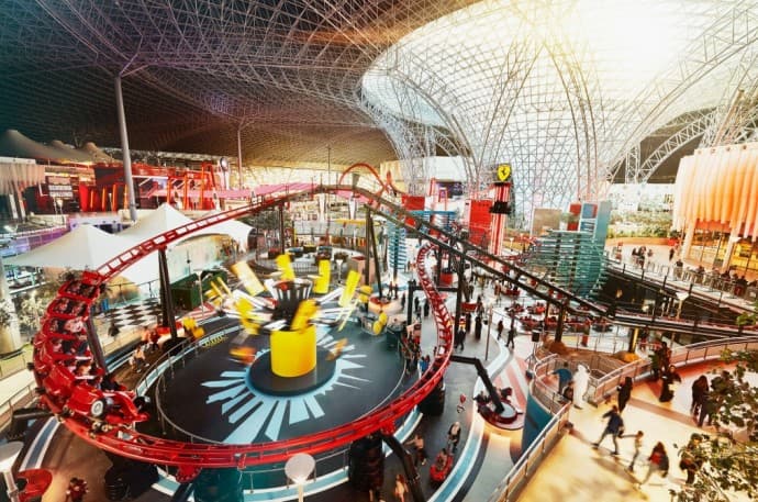 Main exterior view of Ferrari World Abu Dhabi on Yas Island featuring the iconic red Ferrari roof.