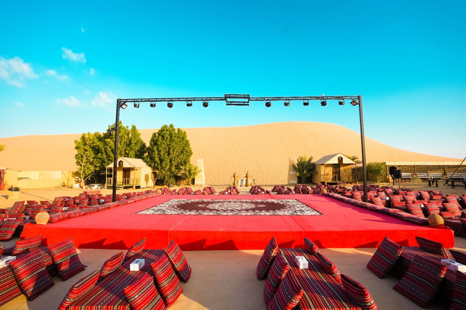 Performance stage at the desert camp during the Abu Dhabi Desert Safari experience, used for live shows and entertainment.