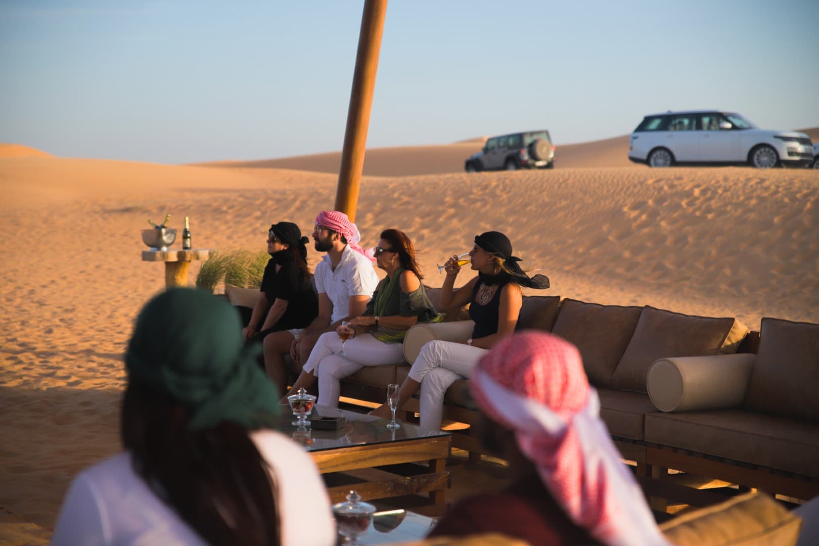 Luxury seating setup in the desert during the Platinum Desert Safari experience in Dubai.