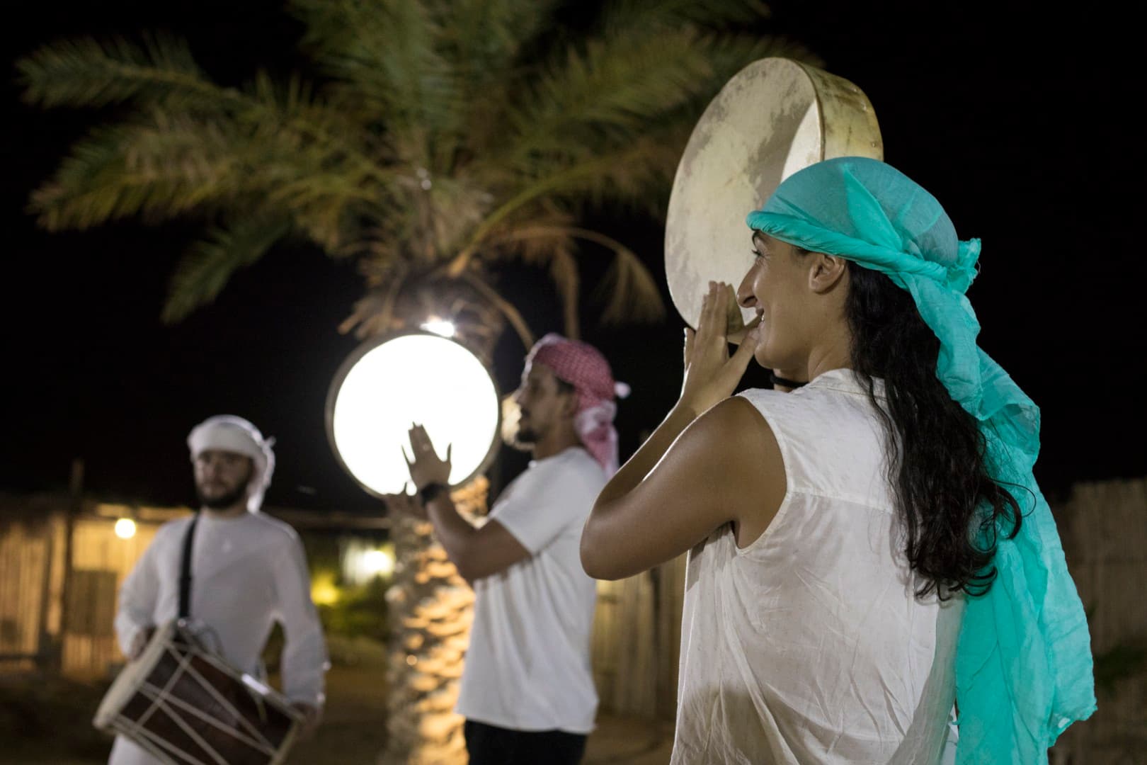 Traditional Arabic dance performance at the Bedouin camp during the Heritage Desert Safari experience in Dubai.