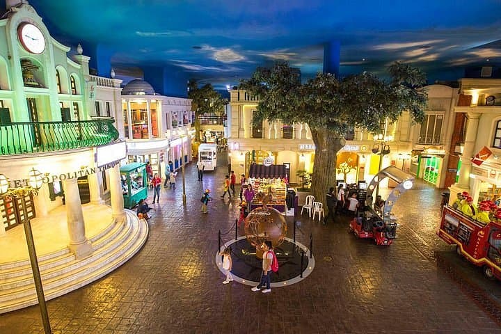 City center area inside KidZania Dubai with realistic streets and role-play activity zones for kids.