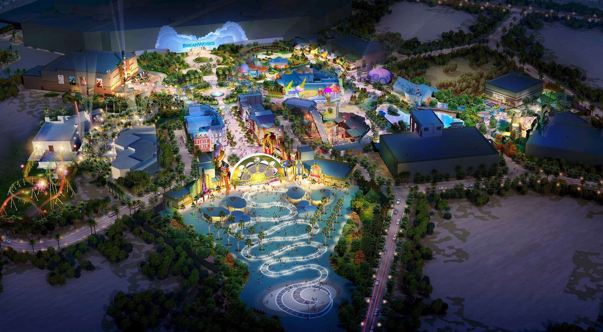 Aerial view of a brightly lit theme park at night