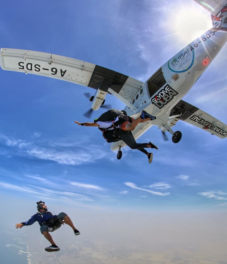 Adrenaline skydiving jump above Dubai skyline