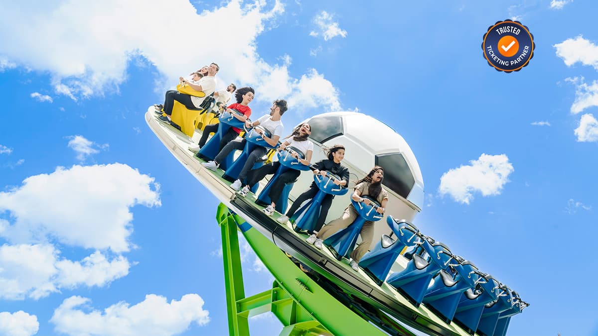 Kids enjoying football-themed rides and attractions at Real Madrid World theme park
