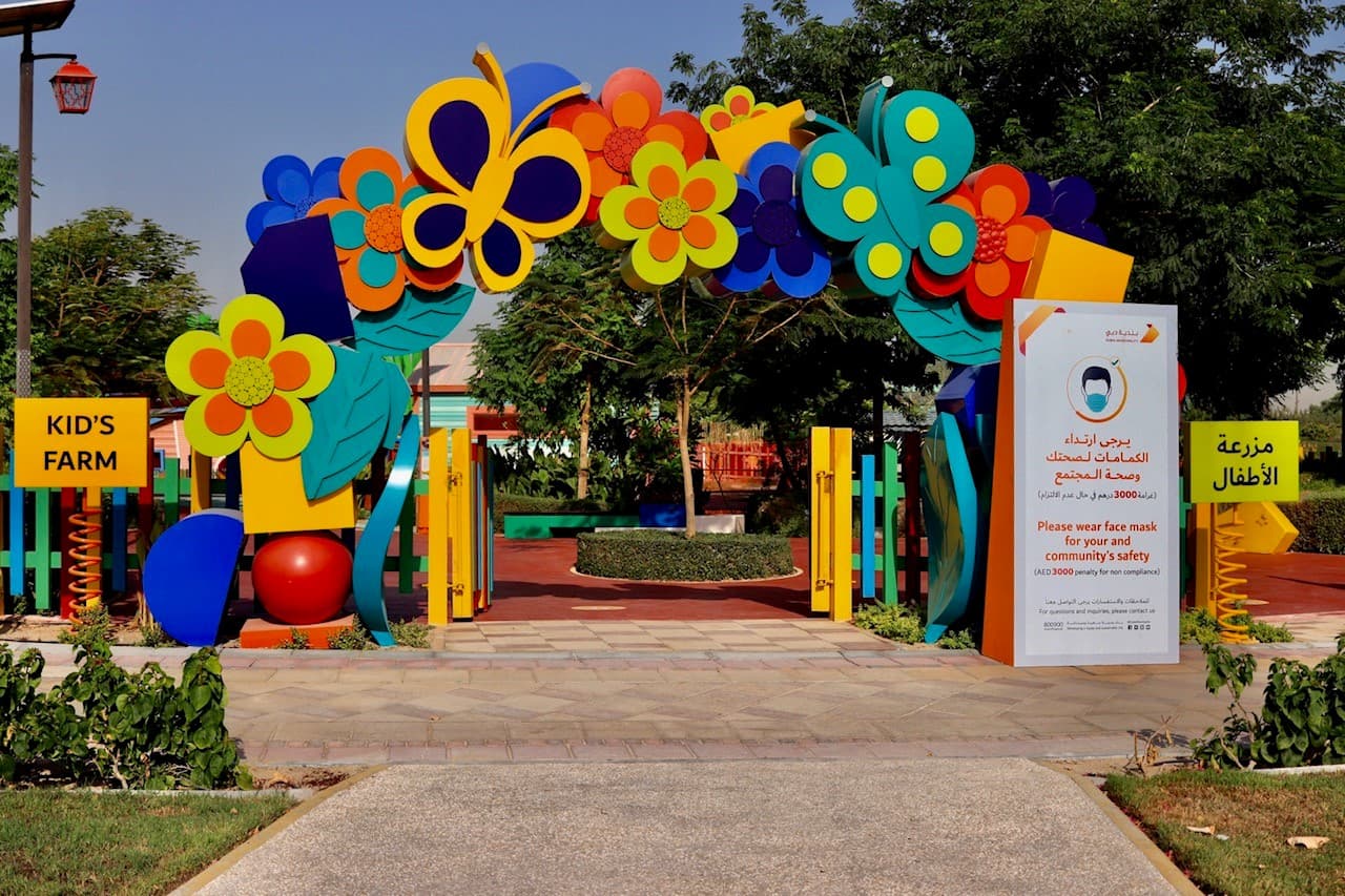 Kids Farm area at Dubai Safari Park where children interact with farm animals in a family-friendly setting