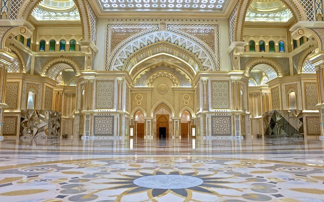 Great Hall inside Qasr Al Watan in Abu Dhabi showcasing grand domes, intricate designs, and elegant architecture.