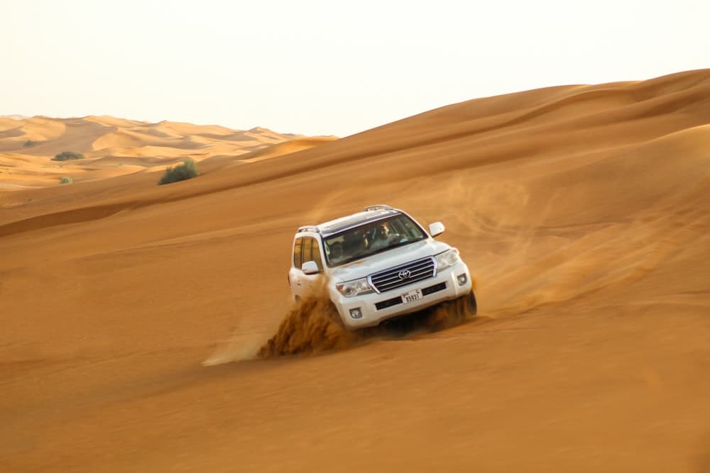 4x4 vehicles ready for an adventurous desert drive during the Ras Al Khaimah desert safari.