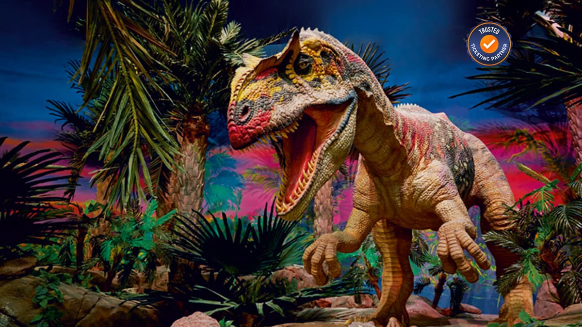 Large dinosaur figure displayed in the Lost Valley dinosaur zone at IMG Worlds of Adventure.