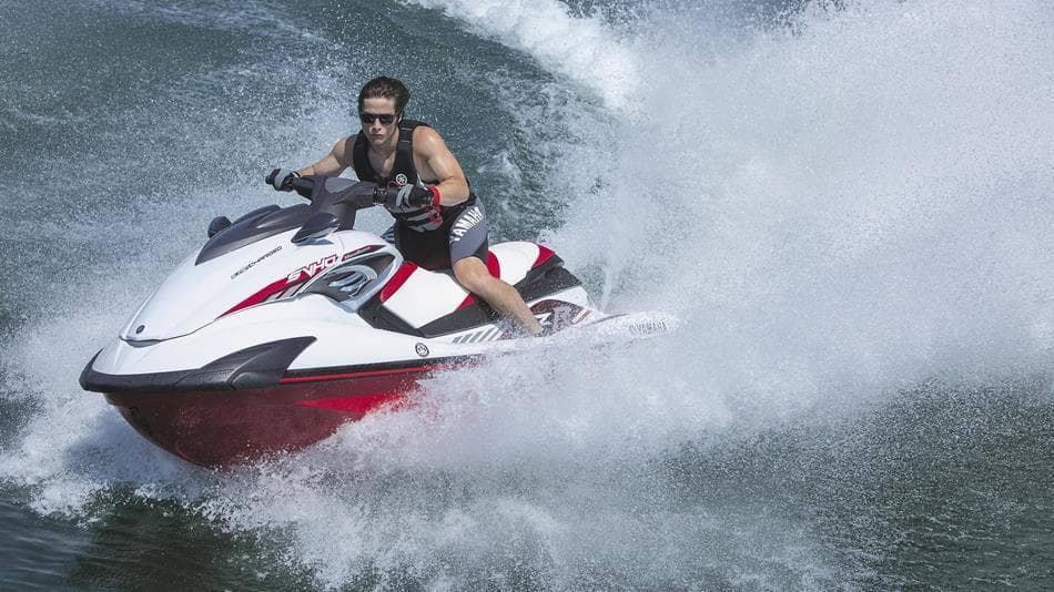 A man enjoying a jet ski ride on water during a single tour in Dubai.