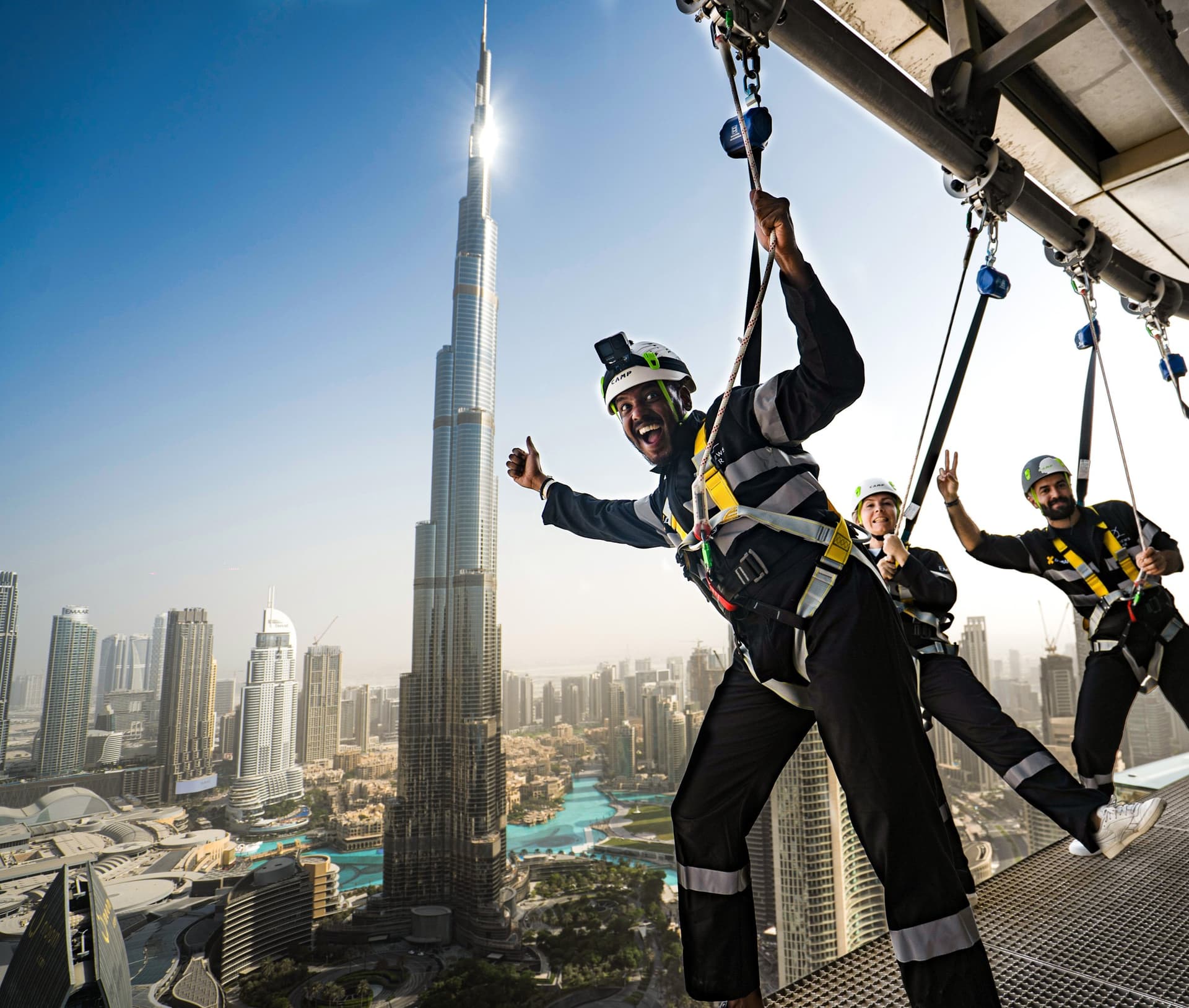 Visitor experiencing sky hanging at Sky Views Dubai while suspended high above the city skyline