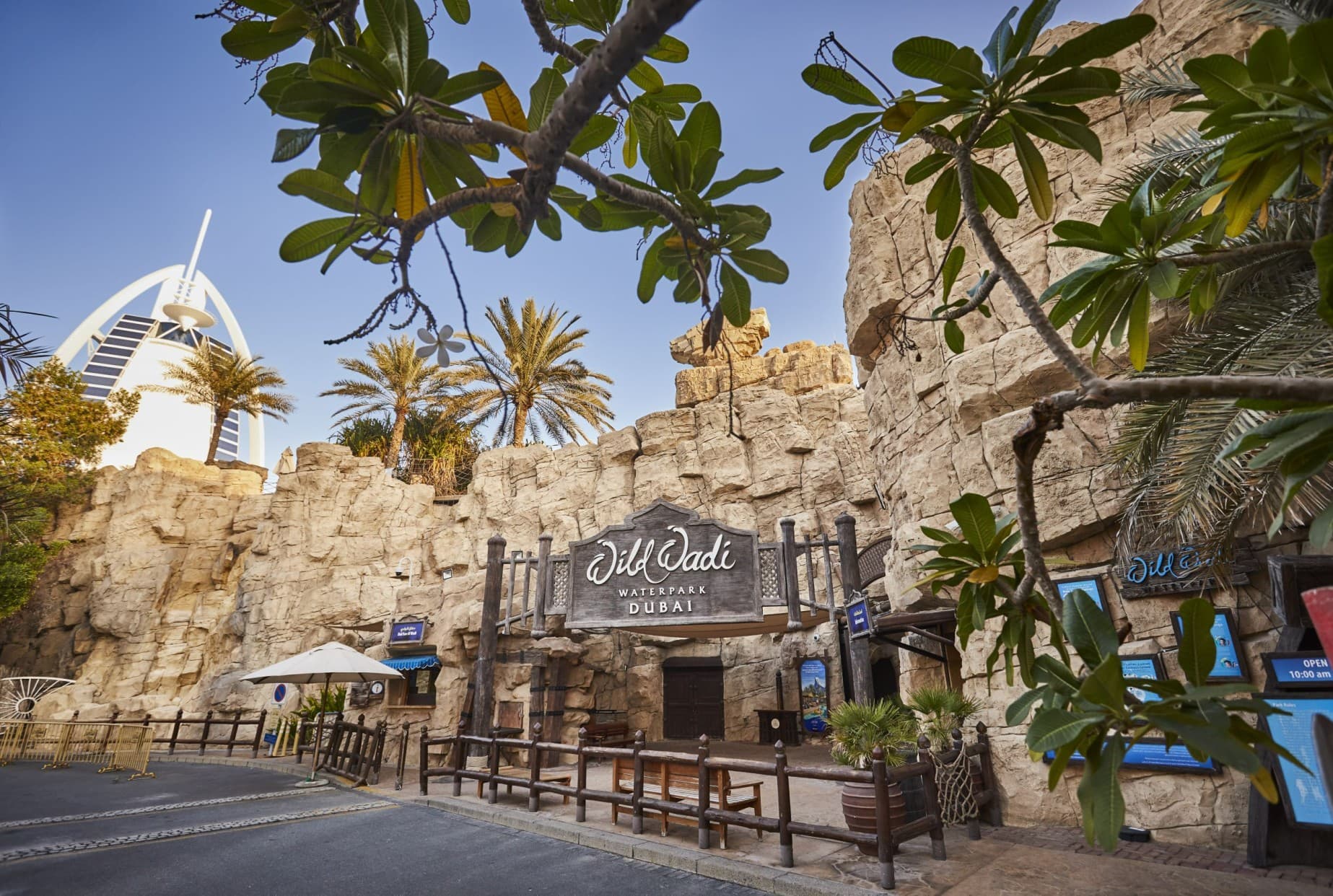 Main entrance gate of Wild Wadi Waterpark in Dubai with themed architecture and welcome signage.