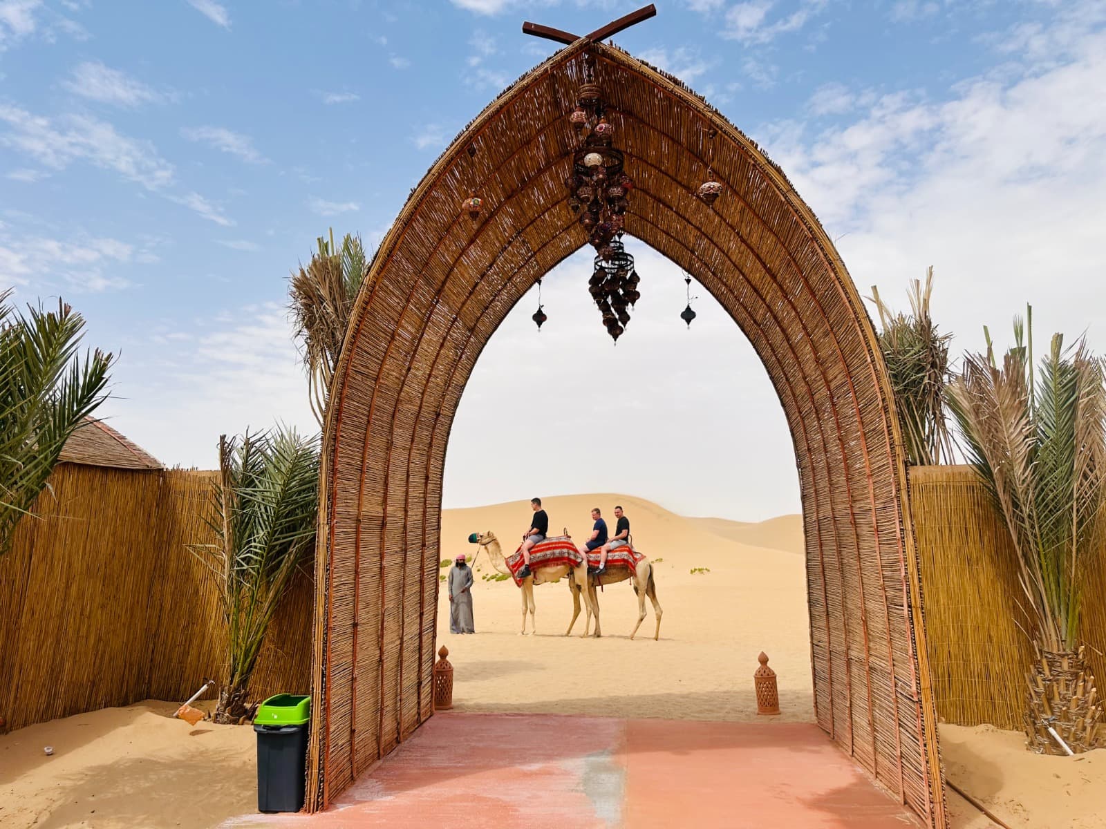 Entrance to the private desert safari camp in Dubai, welcoming guests to a luxury desert experience.