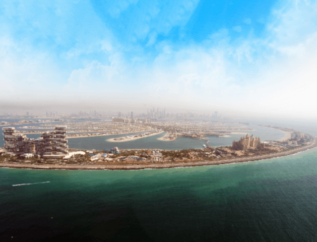 Aerial view of Palm Jumeirah cityscape during a private helicopter tour, showcasing iconic architecture and coastline.