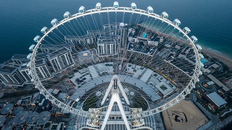 Aerial view of Ain Dubai giant observation wheel at Bluewaters Island overlooking the Dubai coastline.
