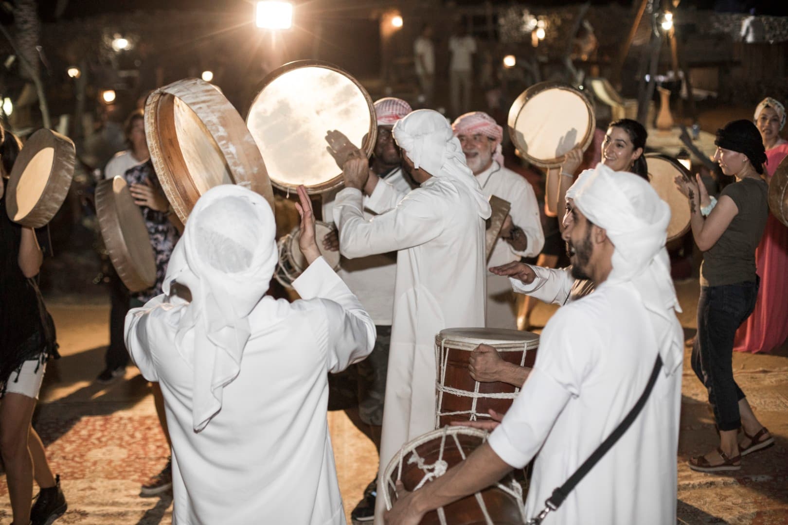 Traditional Arabic musical dance performance at the Bedouin camp during the Heritage Desert Safari in Dubai.