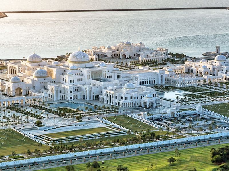 Qasr Al Watan in Abu Dhabi, showcasing its stunning white domes and intricate architectural details.