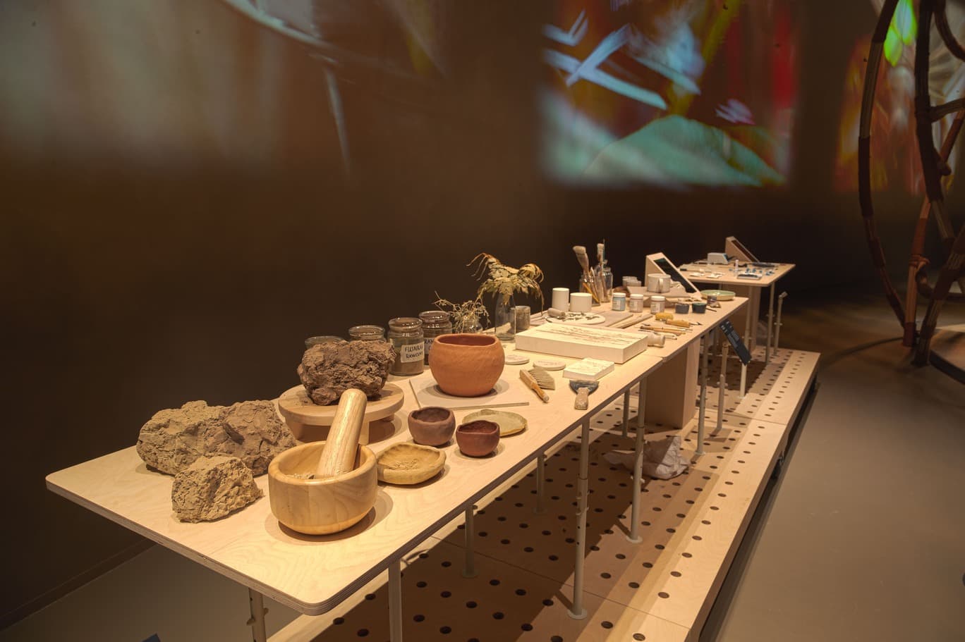 Visitors exploring historical exhibits inside the Qasr Al Hosn museum in Abu Dhabi.