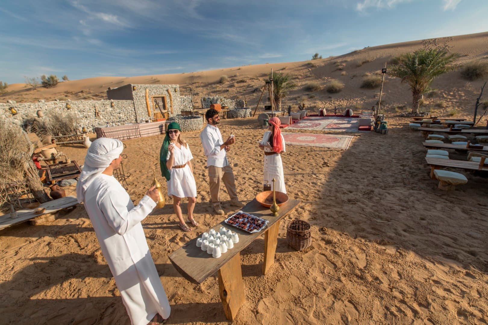 Traditional Bedouin camp setup at the Heritage Desert Safari in Dubai with tents and desert ambiance