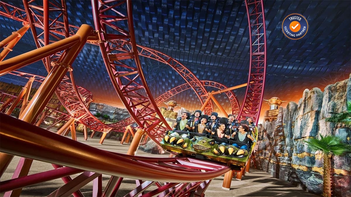 High-speed roller coaster inside IMG Worlds of Adventure with guests enjoying the thrilling ride