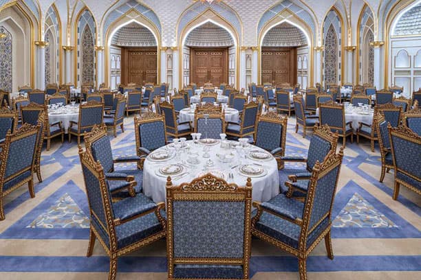 Banquet hall inside Qasr Al Watan in Abu Dhabi showcasing elegant tables and luxurious interior design