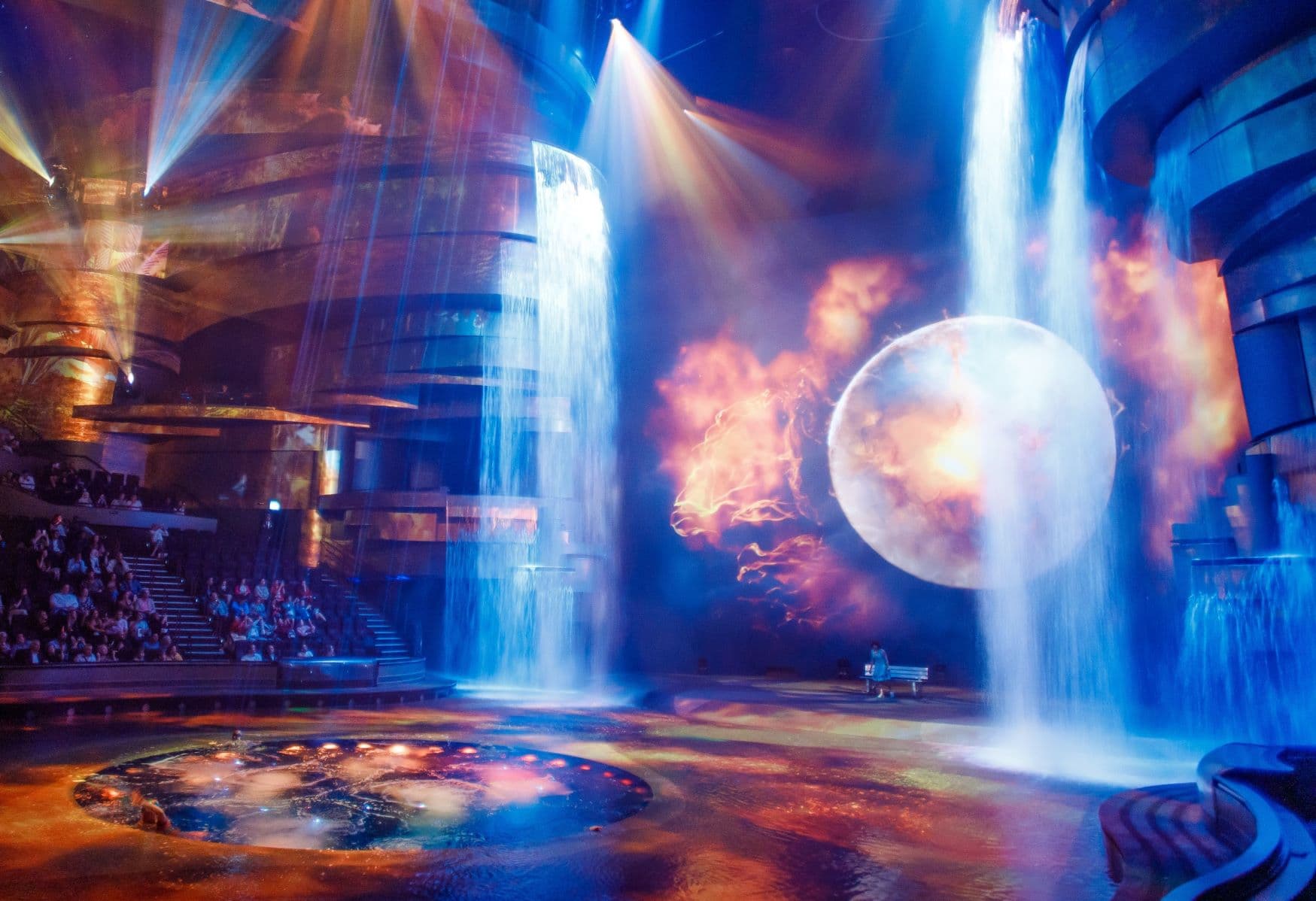 Spectacular light show performance during the La Perle by Dragone live show in Dubai.