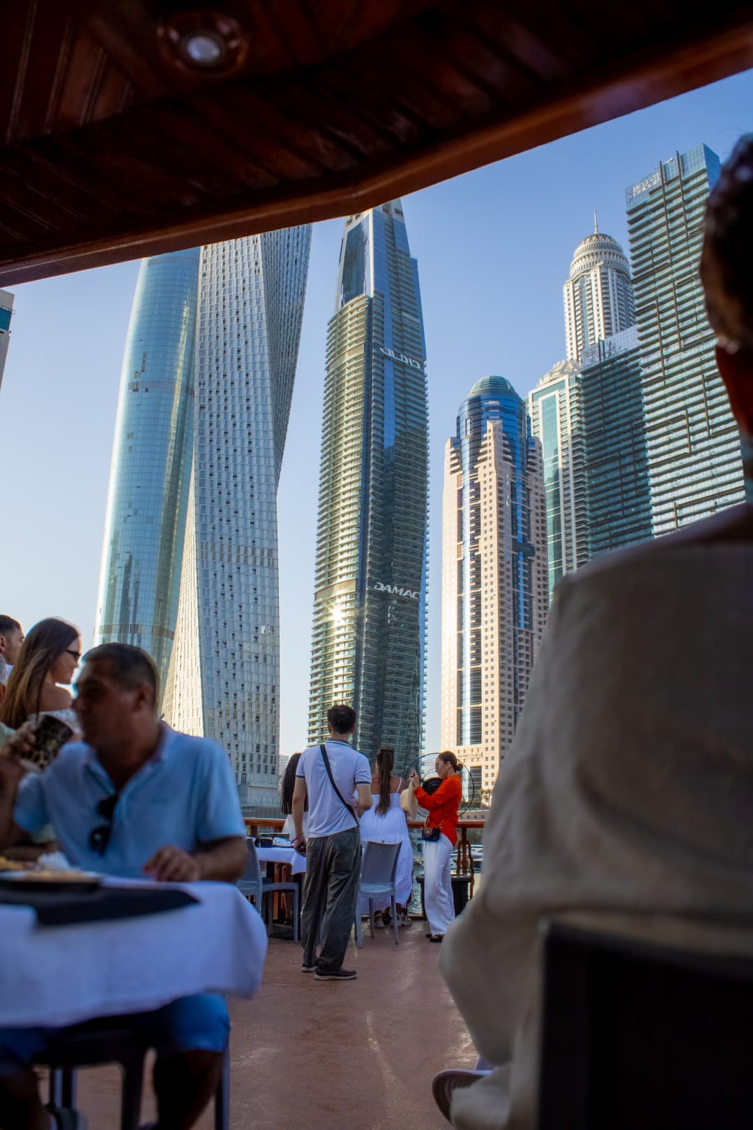 Scenic Dubai Marina canal view at sunset from dhow cruise upper deck