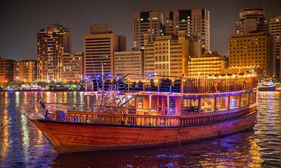 Royal dinner cruise boat offering scenic views along Dubai Creek