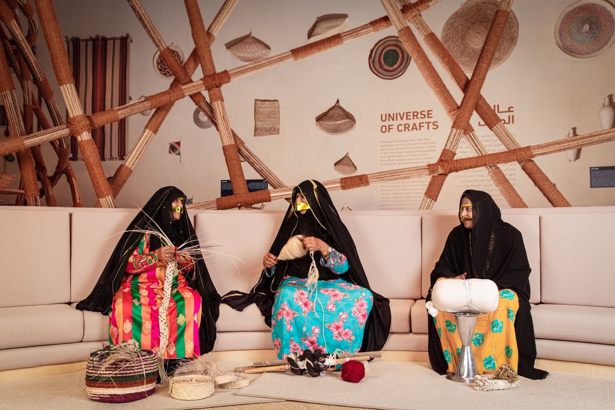 Visitors exploring the cultural heritage displays at Qasr Al Hosn in Abu Dhabi.