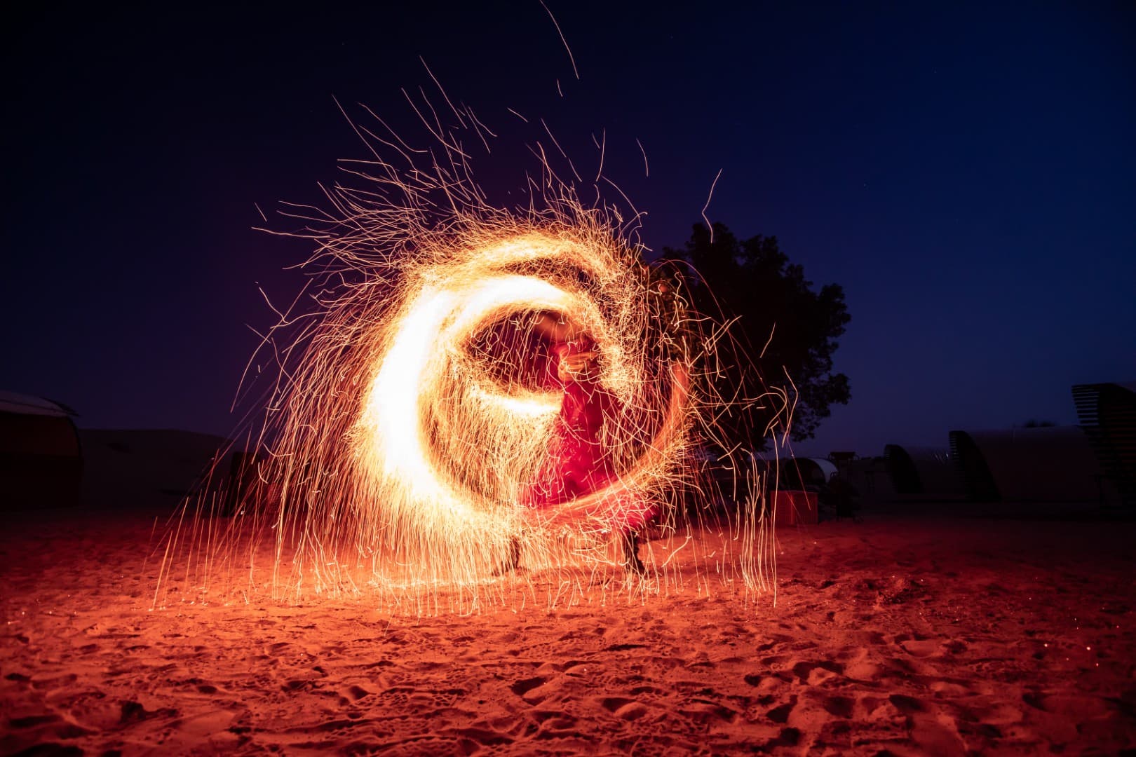 Entertaining fire dance show during the evening program at Platinum Desert Safari Dubai.