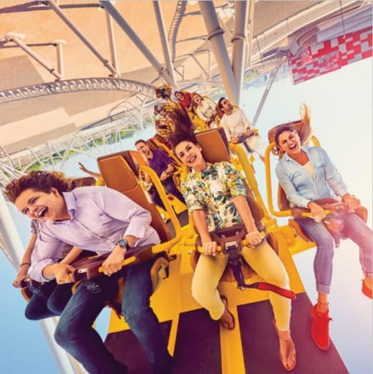 Visitors enjoying one of the best roller coaster activities at Ferrari World Abu Dhabi on Yas Island