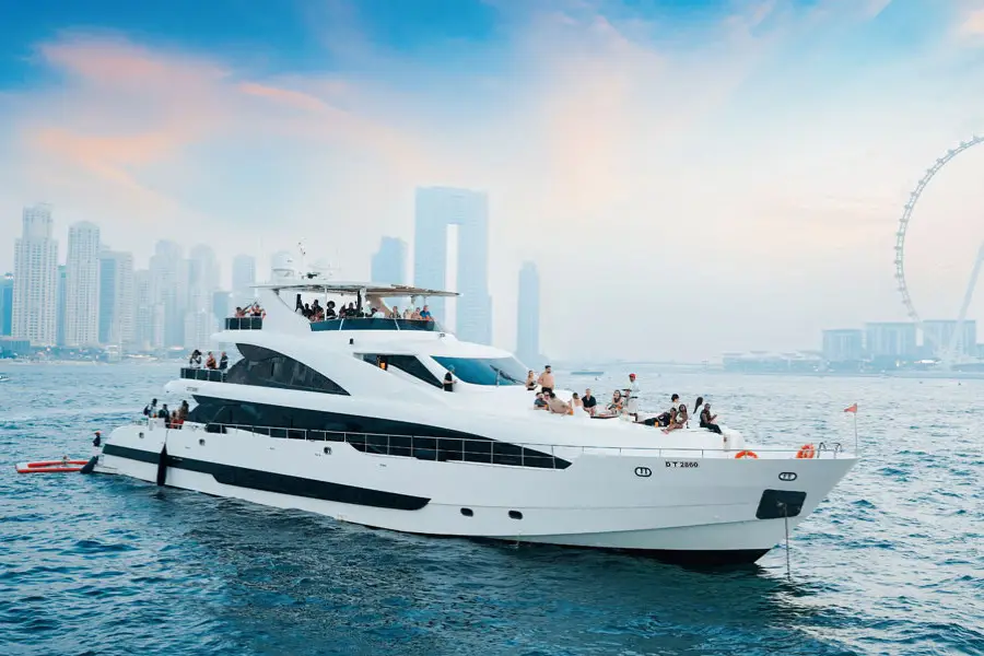 Travelers relaxing on luxury yacht lounge in Dubai Marina