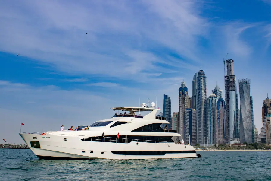 Luxury superyacht tour cruising through Dubai Marina skyline