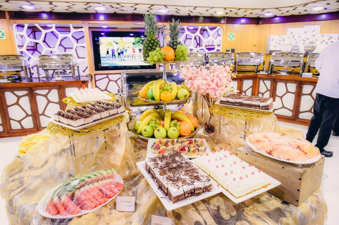 Dessert and fruit platter served on the Lotus Mega Yacht dinner cruise