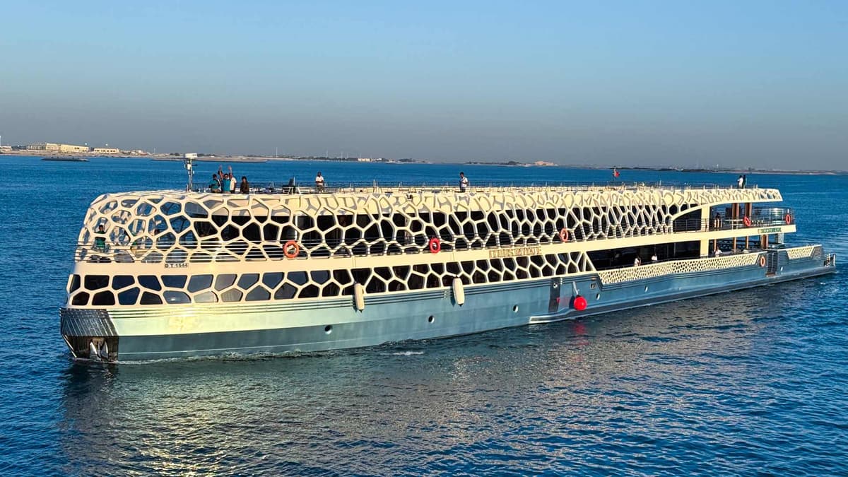 Panoramic view of the Lotus Royale yacht during evening cruise